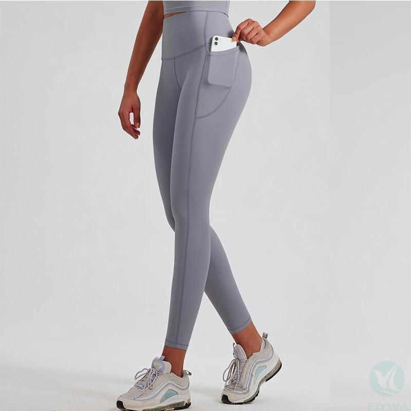 Women＇s high waisted and hip lifting peach seamless yoga legging